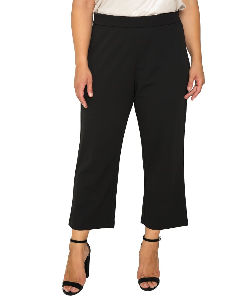 Front of a model wearing a size 14 Ellie High Waist Crepe Crop Pants in Black by Standards & Practices. | dia_product_style_image_id:275942